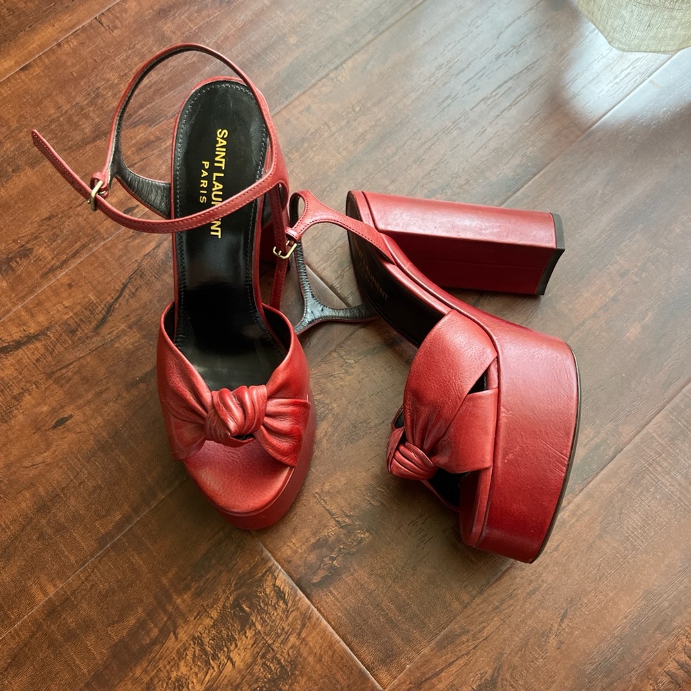 SAINT LAURENT
Red Bianca Knotted Ankle-Strap Platform